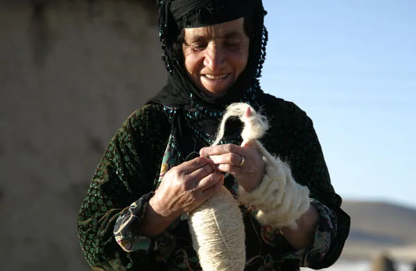 Hand-spinning wool for a Persian rug